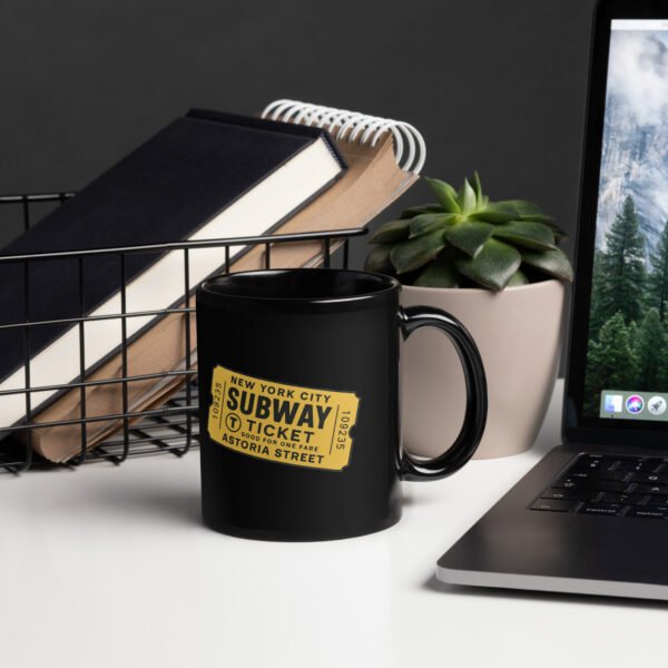 black ceramic mug with retro NYC MetroCard design